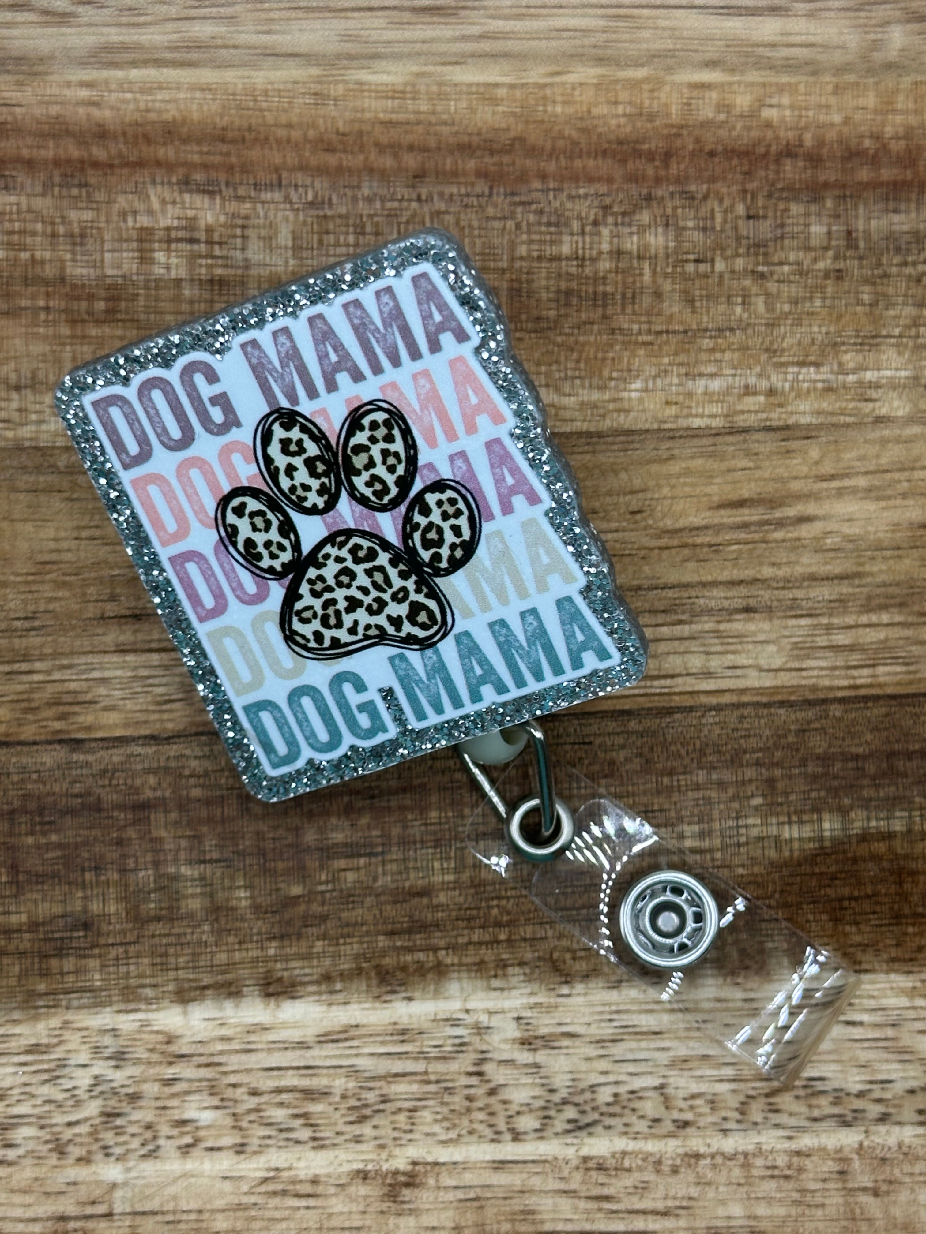 Dog man badge reel