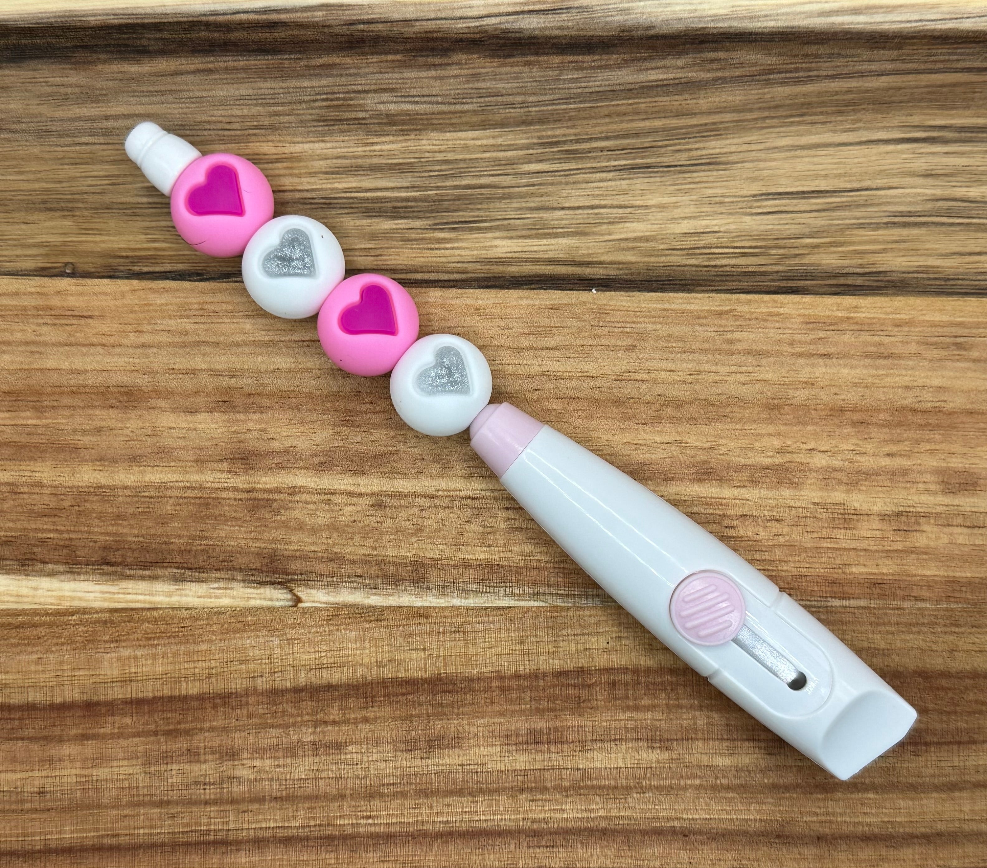Pink and white heart package opener