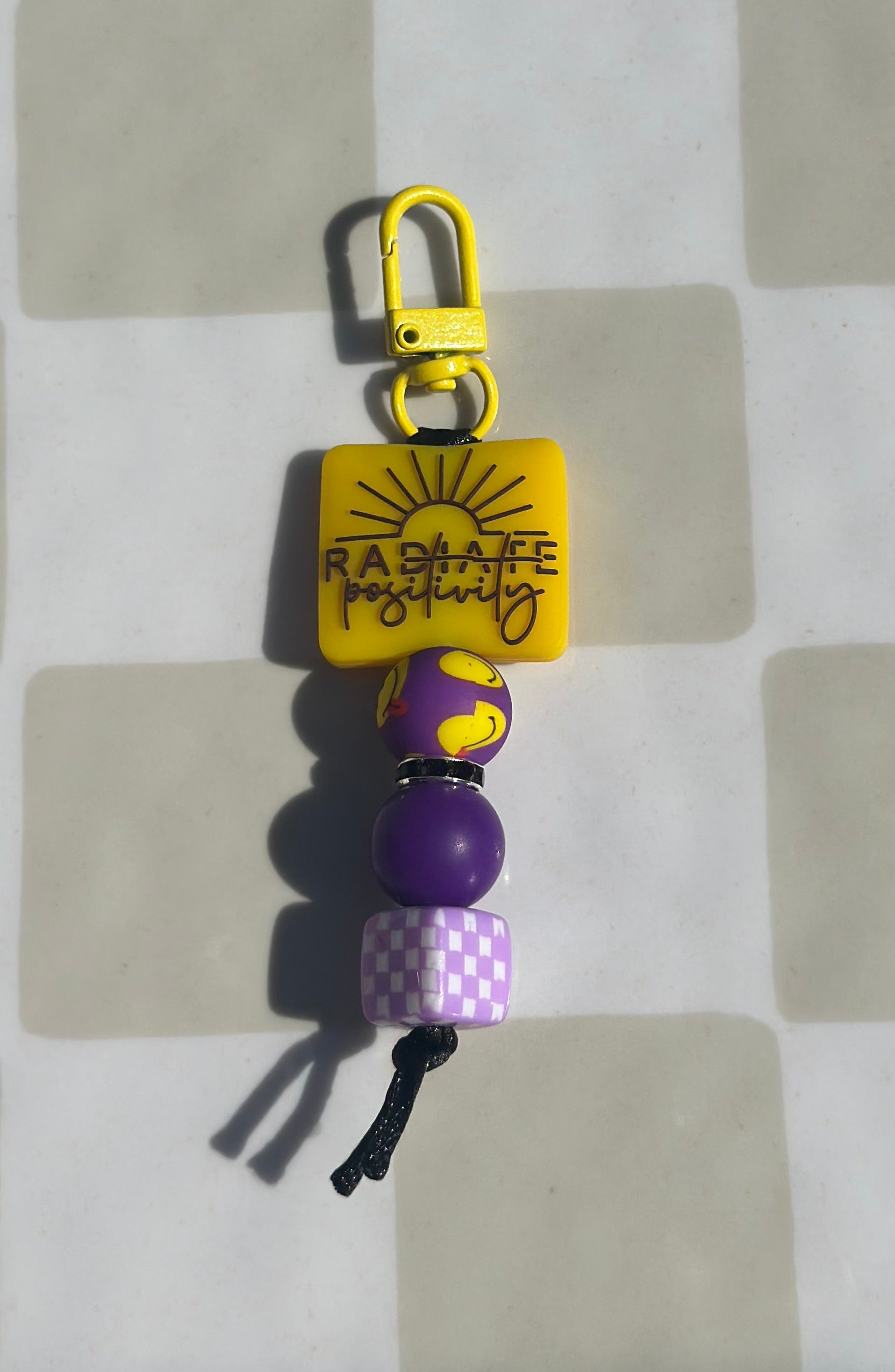Radiate positivity zipper pull/purse charm