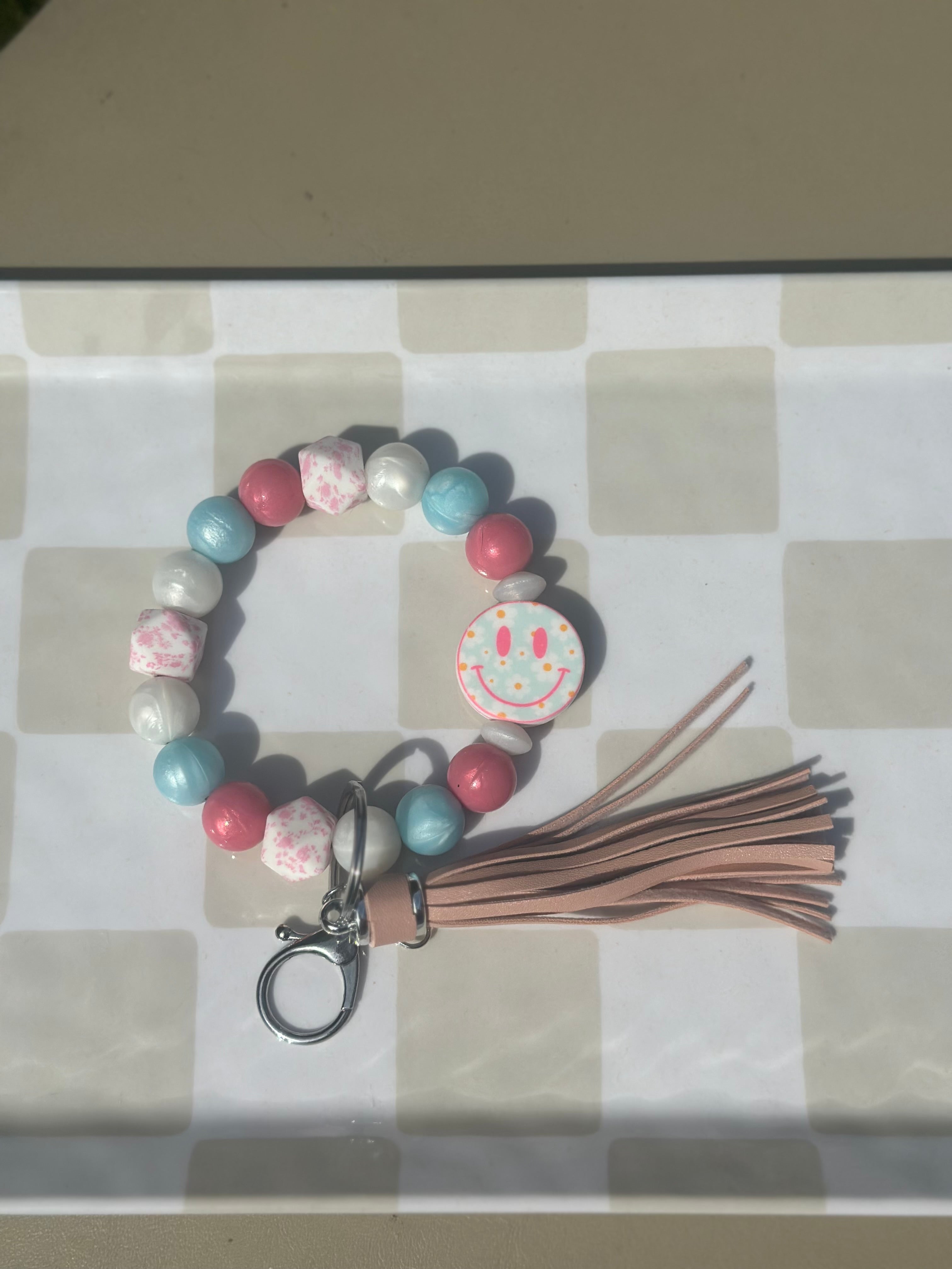 Checkered smiley wristlet/keychain