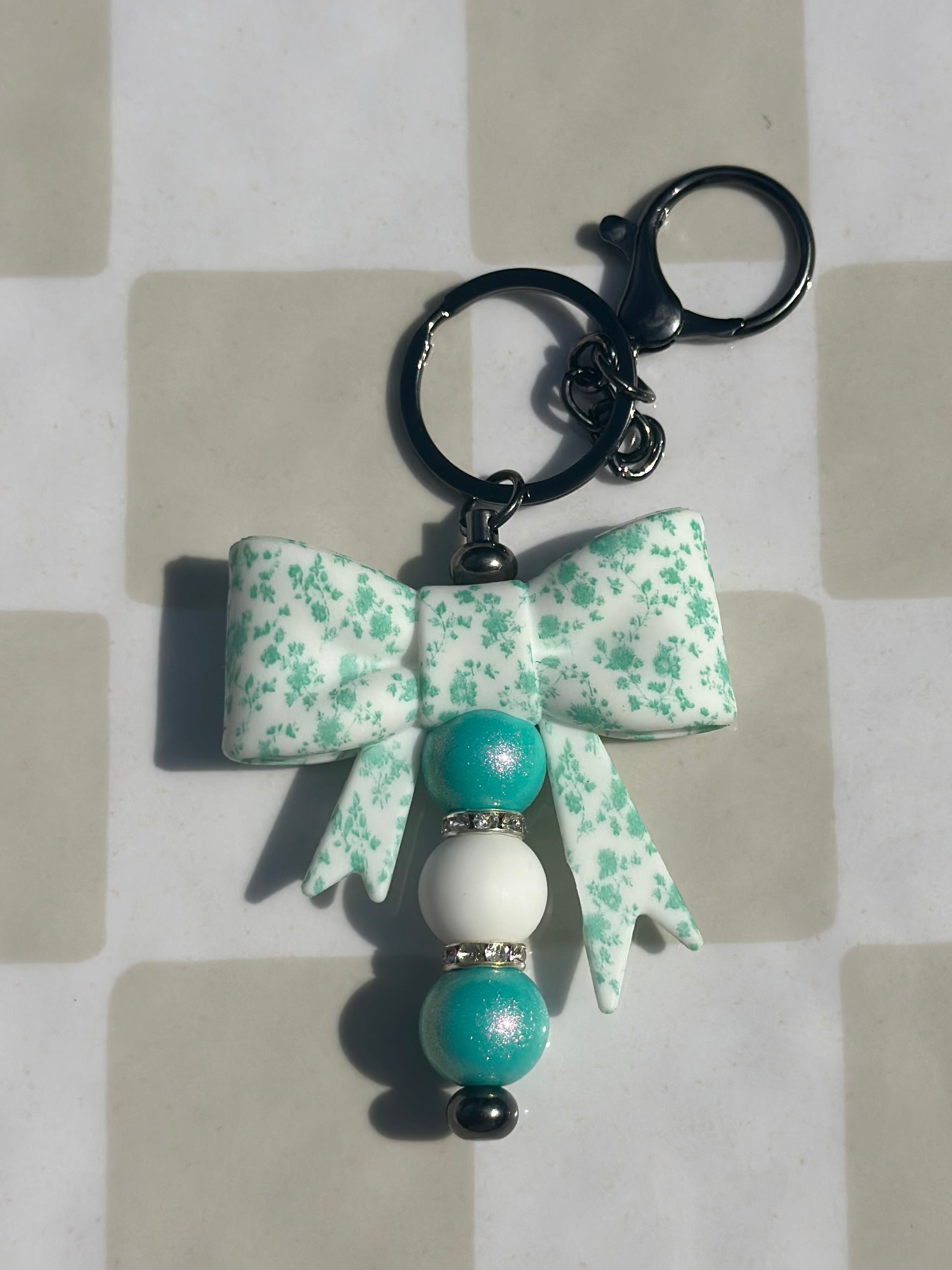Teal and floral bow keychain