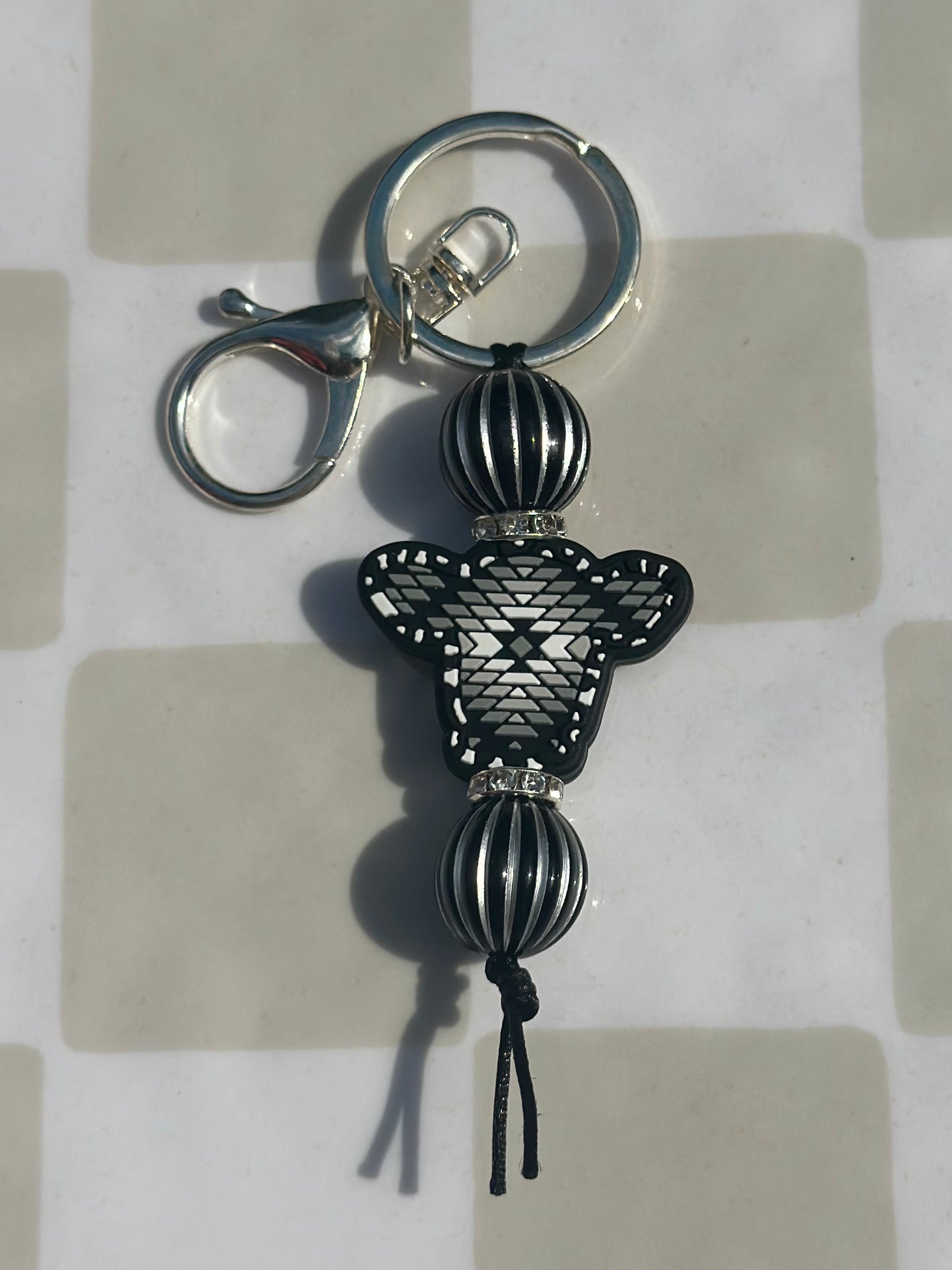 Black and white cow head keychain