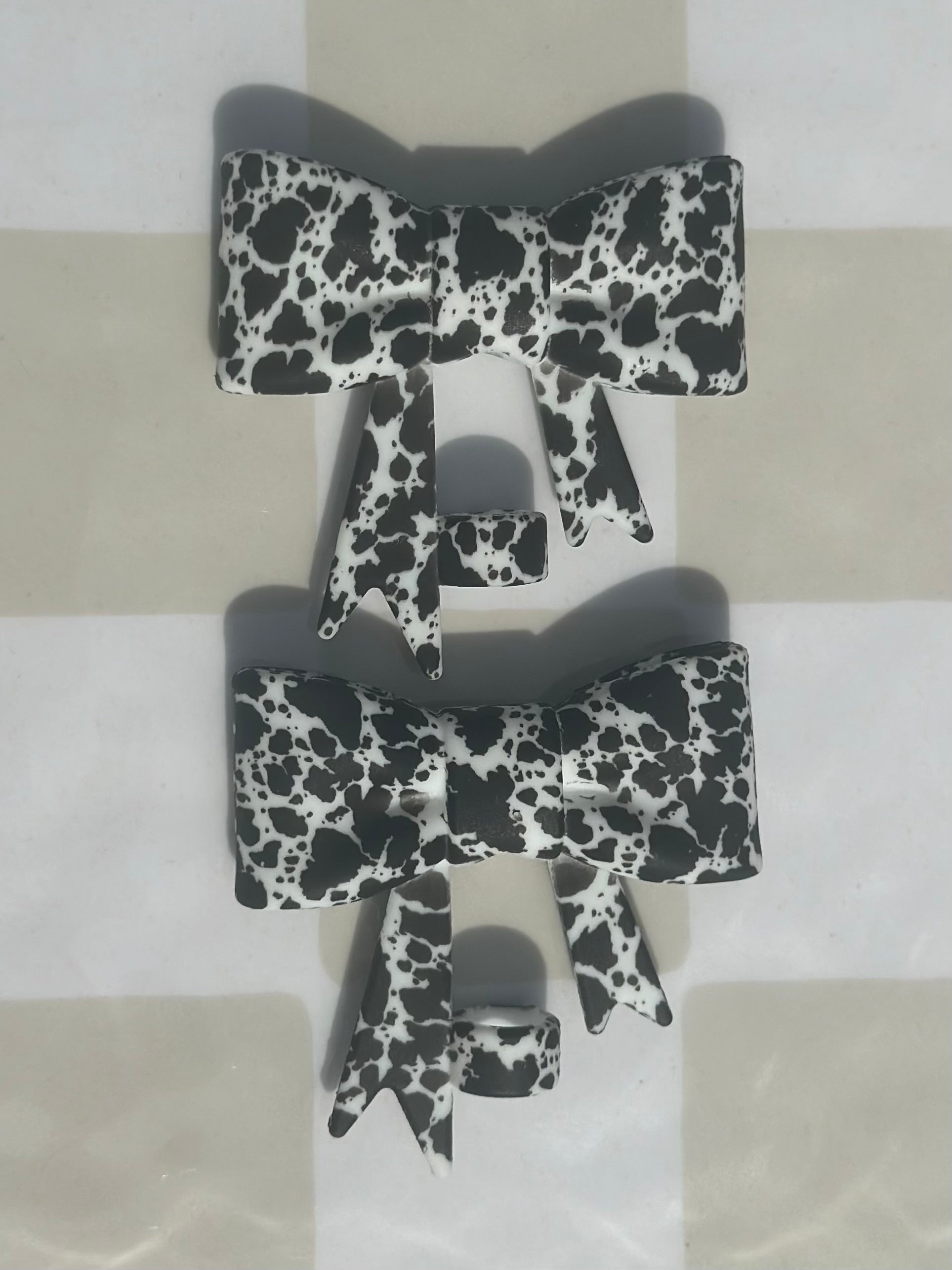 Black and White cowhide bow strawtopper