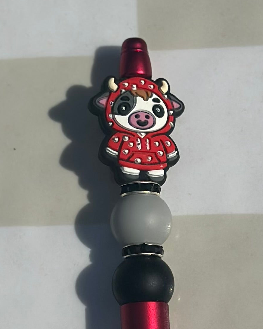 Red coat cow beaded pen