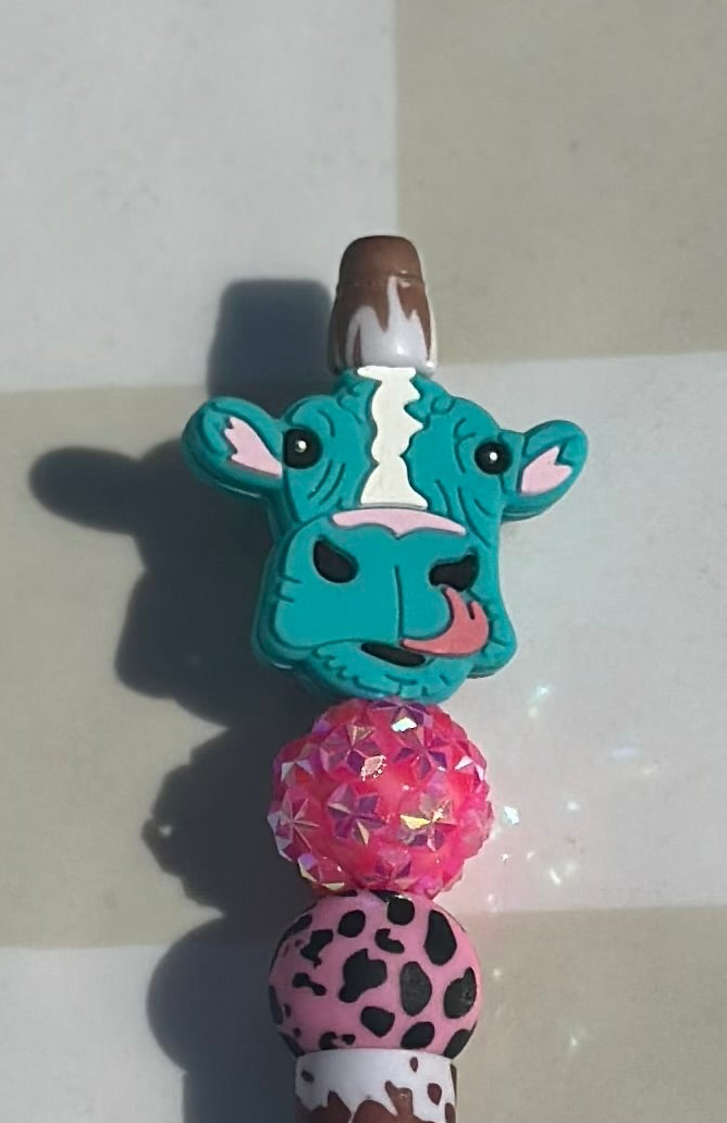 Teal cow beaded pen