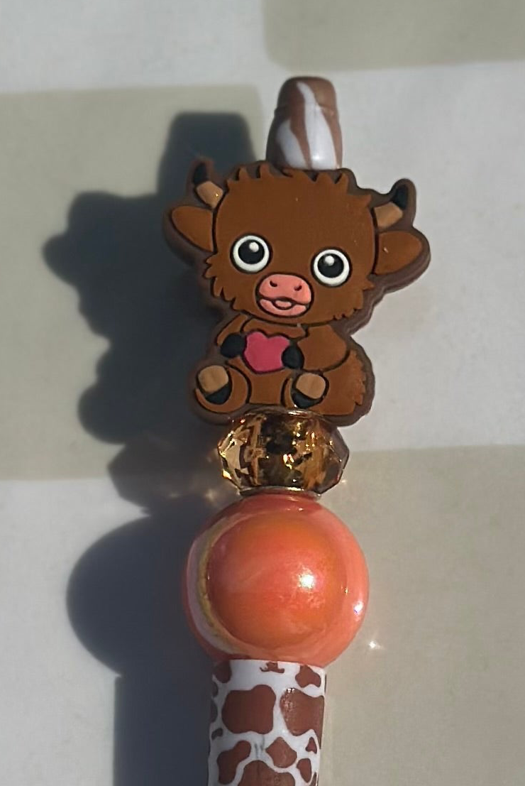 Brown cow with heart beaded pen